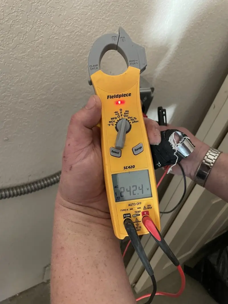 Voltage testing with clamp meter during Circuit Breaker Repair in Saginaw